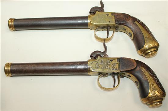 A cased pair of early 19th century brass mounted boxlock pistols, 10in., cased with brass powder horn